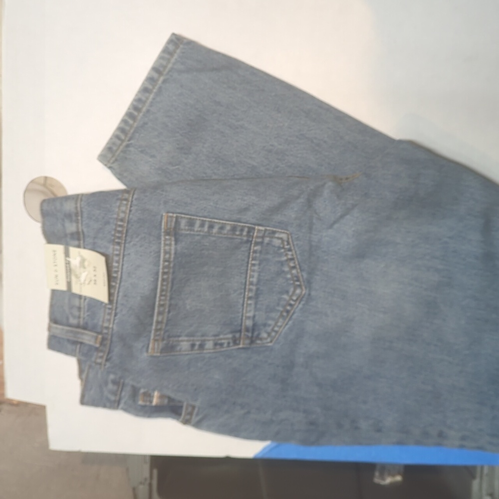 Blue jeans faded stone washed new never used with tags